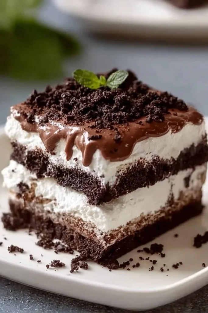 No Bake Oreo Lasagna Dessert with layers of cream and Oreo cookies