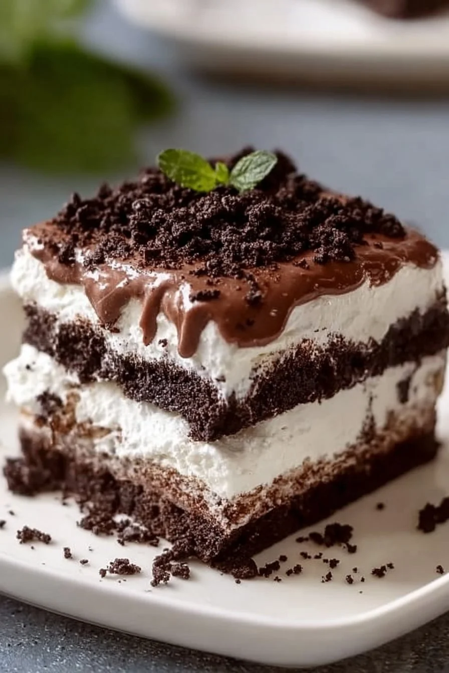 No Bake Oreo Lasagna Dessert with layers of cream and Oreo cookies