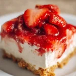 Delicious no-bake strawberry dessert with fresh strawberries and whipped cream.