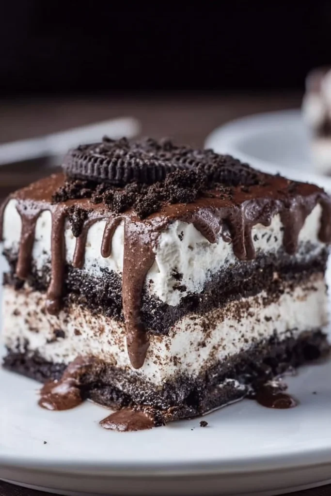 Delicious layered Oreo Lasagna dessert with chocolate and cream filling