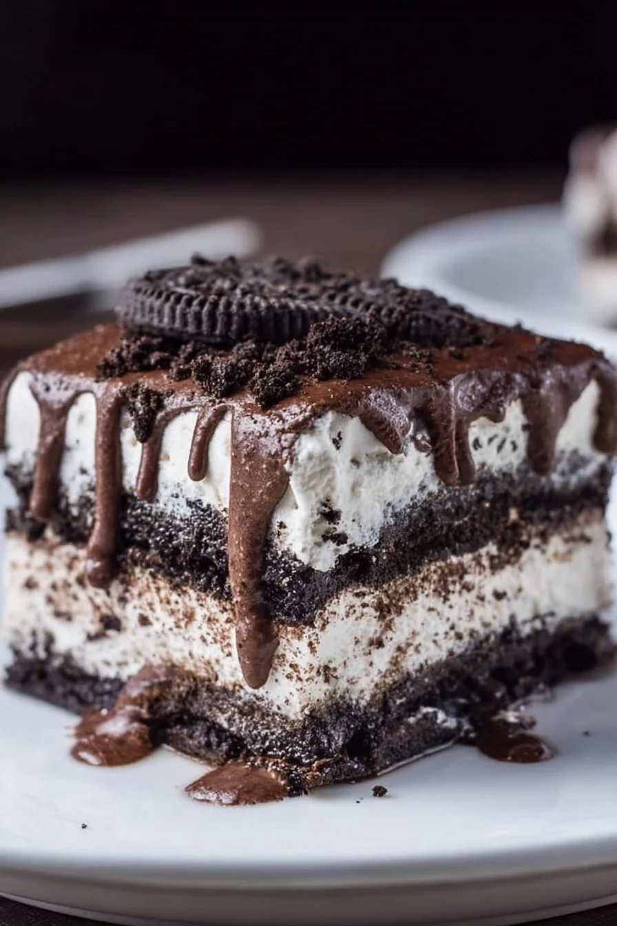 Delicious layered Oreo Lasagna dessert with chocolate and cream filling