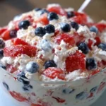 Delicious Red, White, and Blue Cheesecake Salad served in a bowl