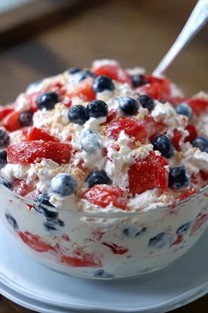 Delicious Red, White, and Blue Cheesecake Salad served in a bowl