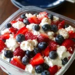 Red, White & Blue Cheesecake Salad with mixed berries and creamy cheesecake