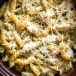 Slow Cooker Pesto Mozzarella Chicken Pasta served hot in a bowl
