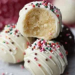 Delicious sugar cookie truffles arranged on a plate, perfect for dessert.