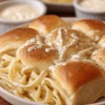 Homemade Texas Roadhouse rolls served with cinnamon butter.