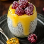 Delicious lemon curd chia pudding served in a glass with fresh lemon slices
