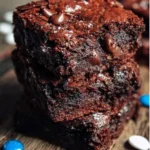 Delicious ultimate easy brownies on a plate with chocolate drizzle